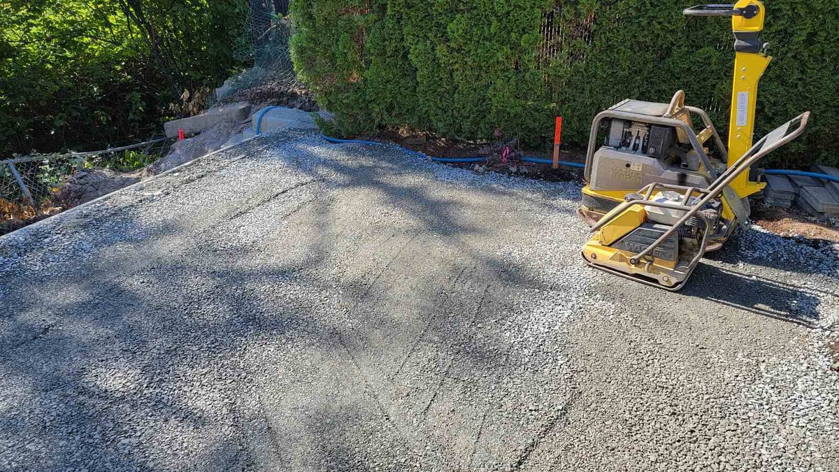 13_Compacting machine on leveled gravel base during landscaping work by Back40 Landscaping in Abbotsford, BC