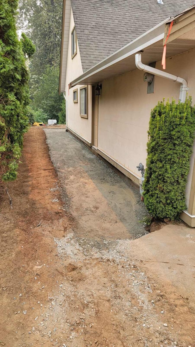 19_Side yard with leveled gravel foundation prepared for landscaping in Abbotsford, BC, by Back40 Landscaping
