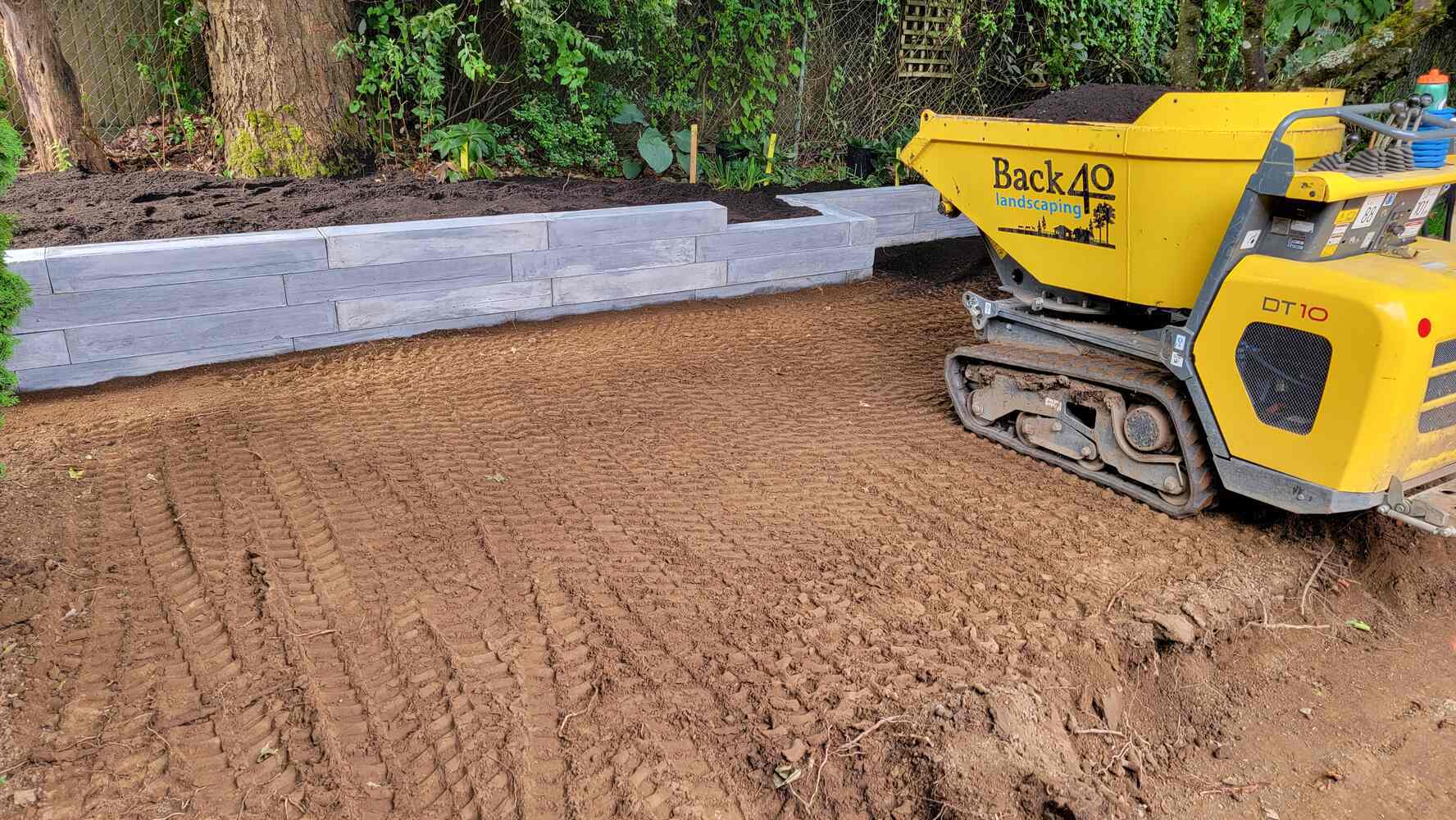 11_yellow-machine-back40-landscaping-retaining-wall-abbotsford-bc-work-in-progress