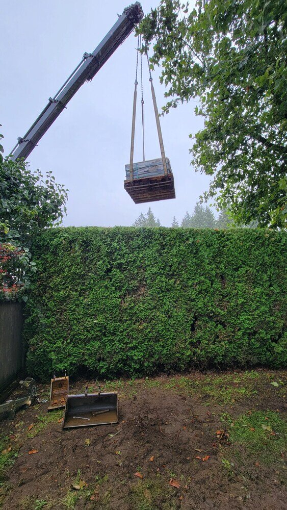 5_Crane equipment used for retaining wall construction by Back40 Landscaping in Abbotsford, BC