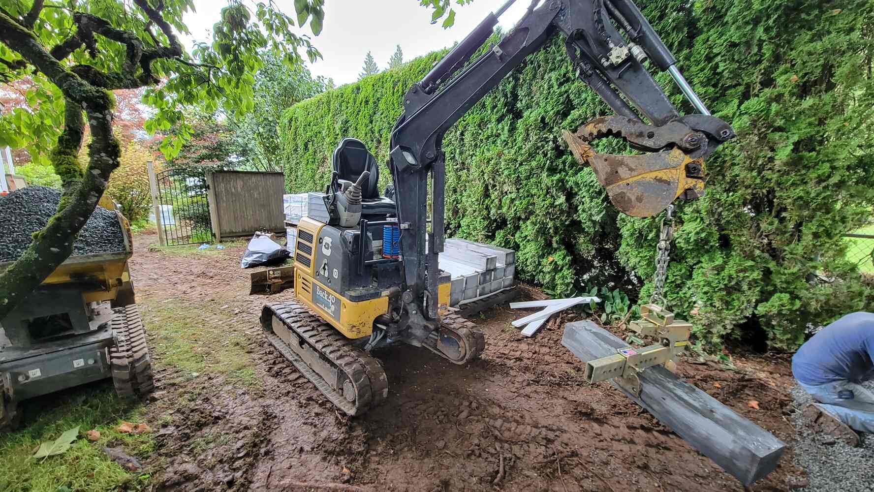 6_Mini excavator used during a retaining wall installation by Back40 Landscaping in Abbotsford, BC