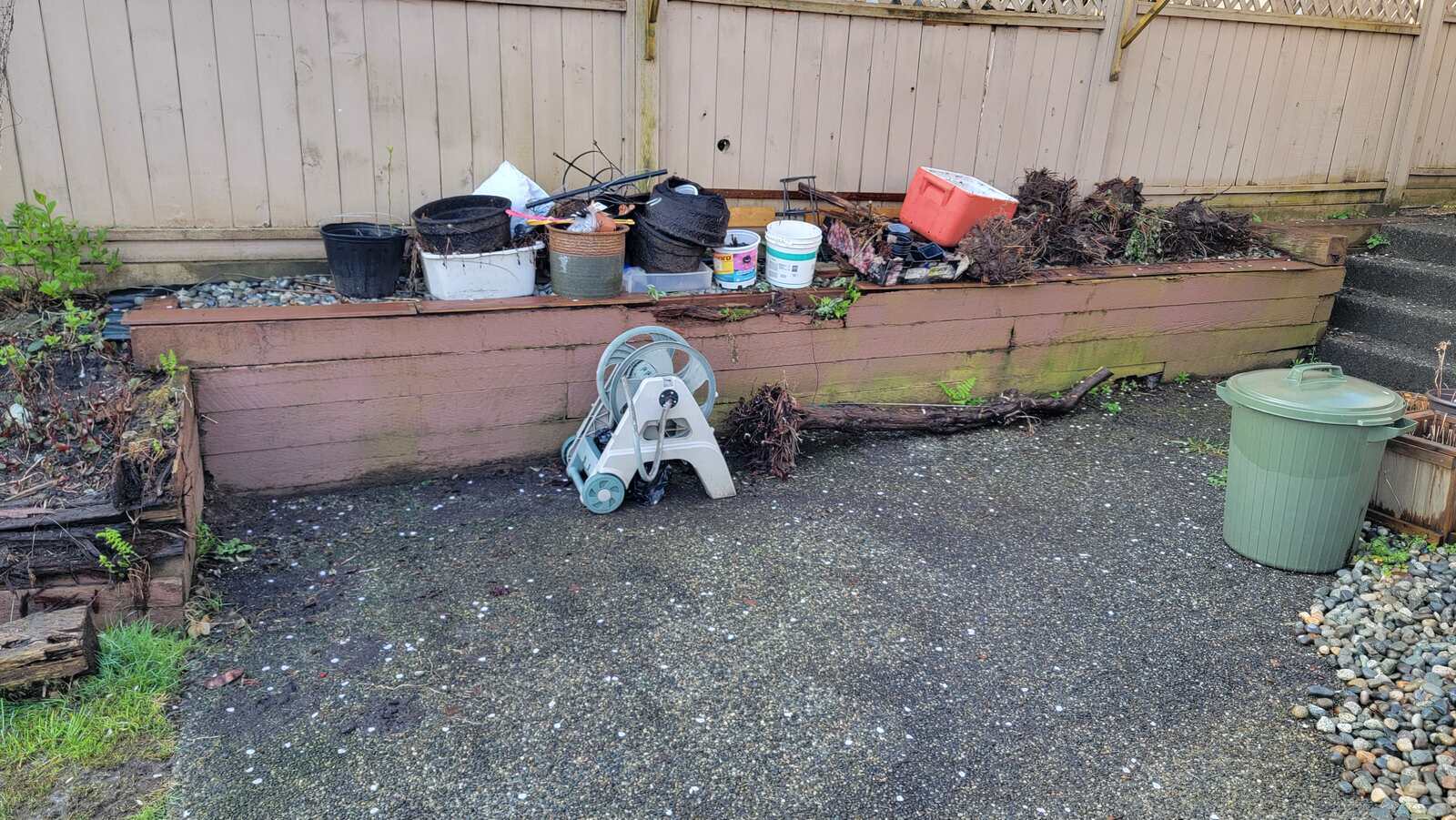 1_retaining-wall-project-back40-landscaping-burnaby-bc-before-construction-area-filled-with-tools-and-debris