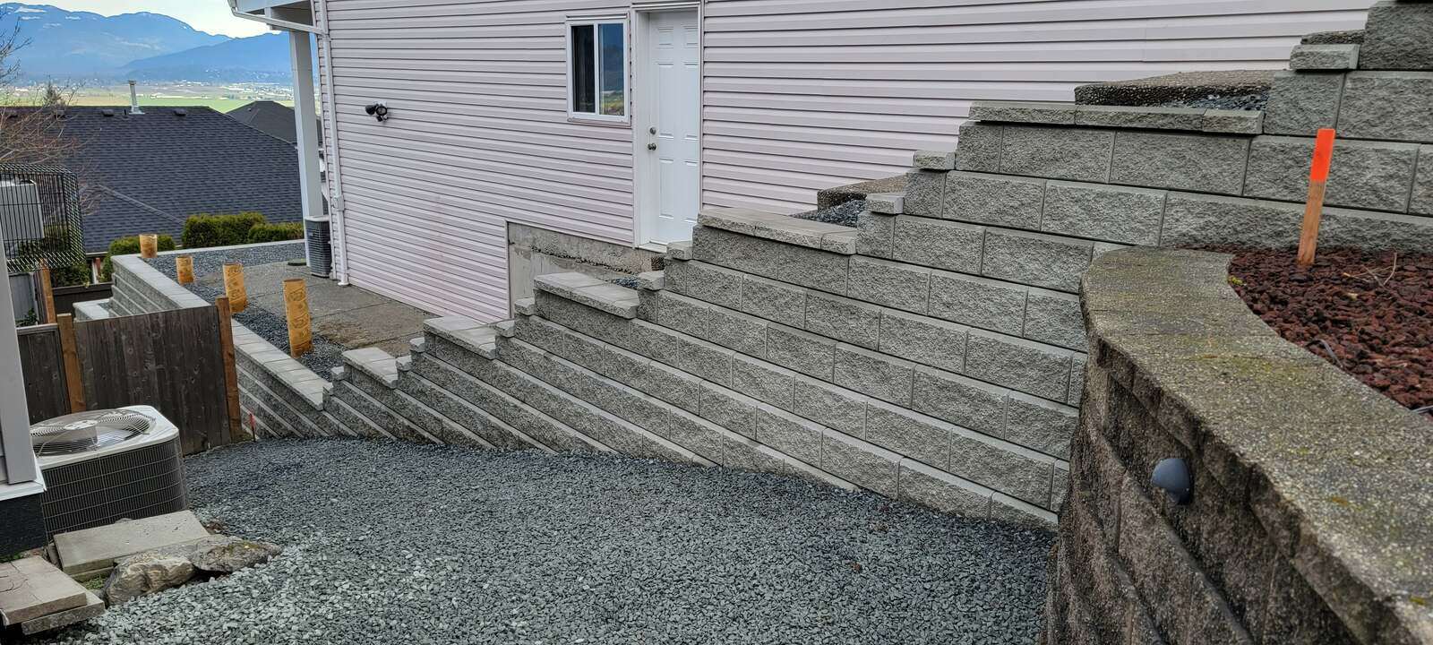 19_final-view-of-retaining-wall-and-staircase-showing-layered-construction-in-chilliwack-bc