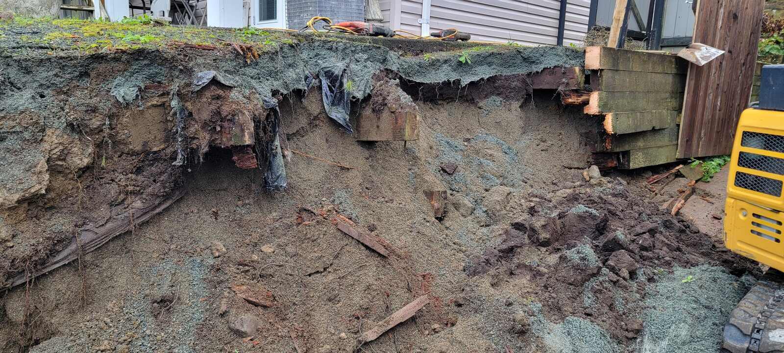3_excavation-progress-revealing-damaged-retaining-wall-structure-in-chilliwack-bc