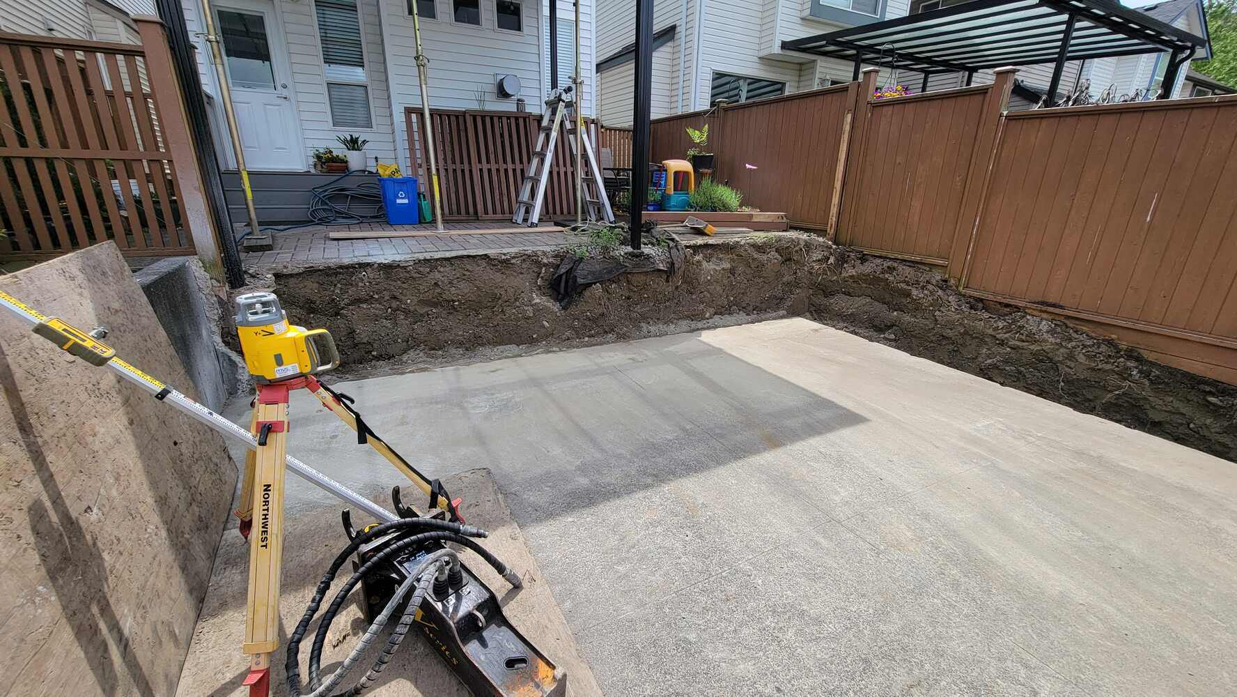 5_excavated-area-after-removing-retaining-wall-preparing-for-new-construction-back40-landscaping-langley-bc