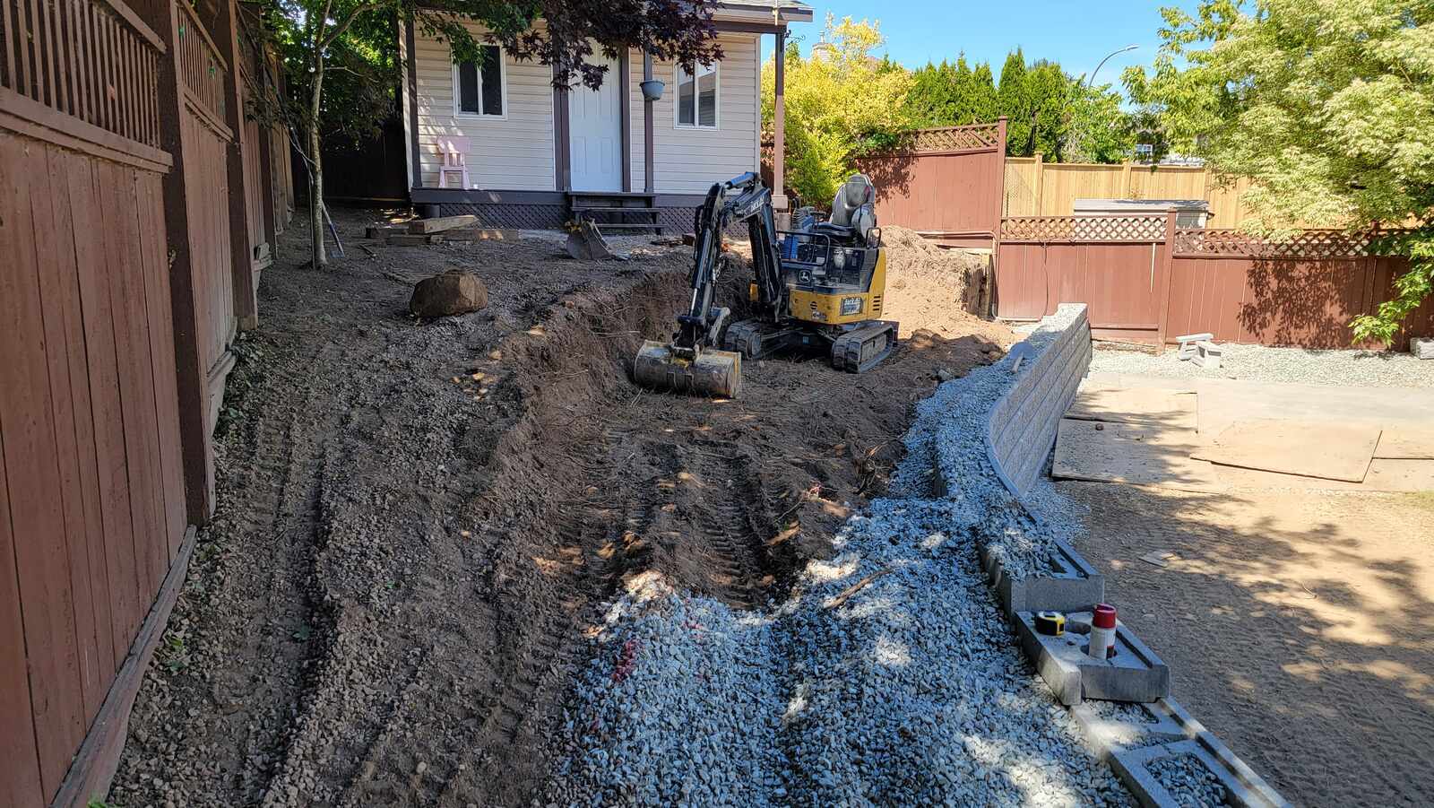 14_Detailed view of retaining wall foundation being built by Back40 Landscaping in Mission, BC