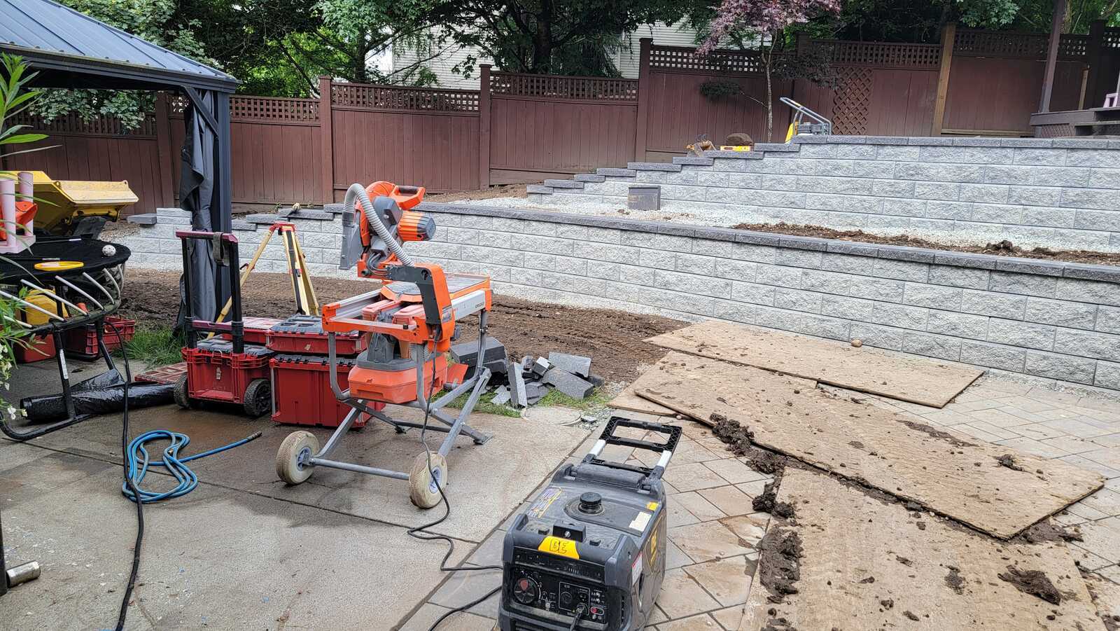 15_Retaining wall nearing completion in backyard landscaping project by Back40 Landscaping, Mission, BC