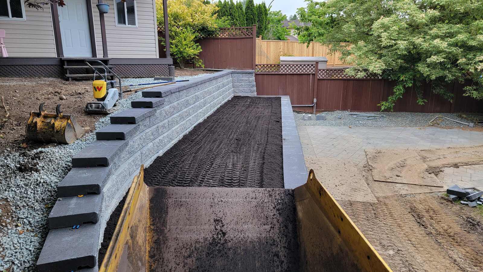 17_Retaining wall installation nearing completion by Back40 Landscaping in Mission, BC