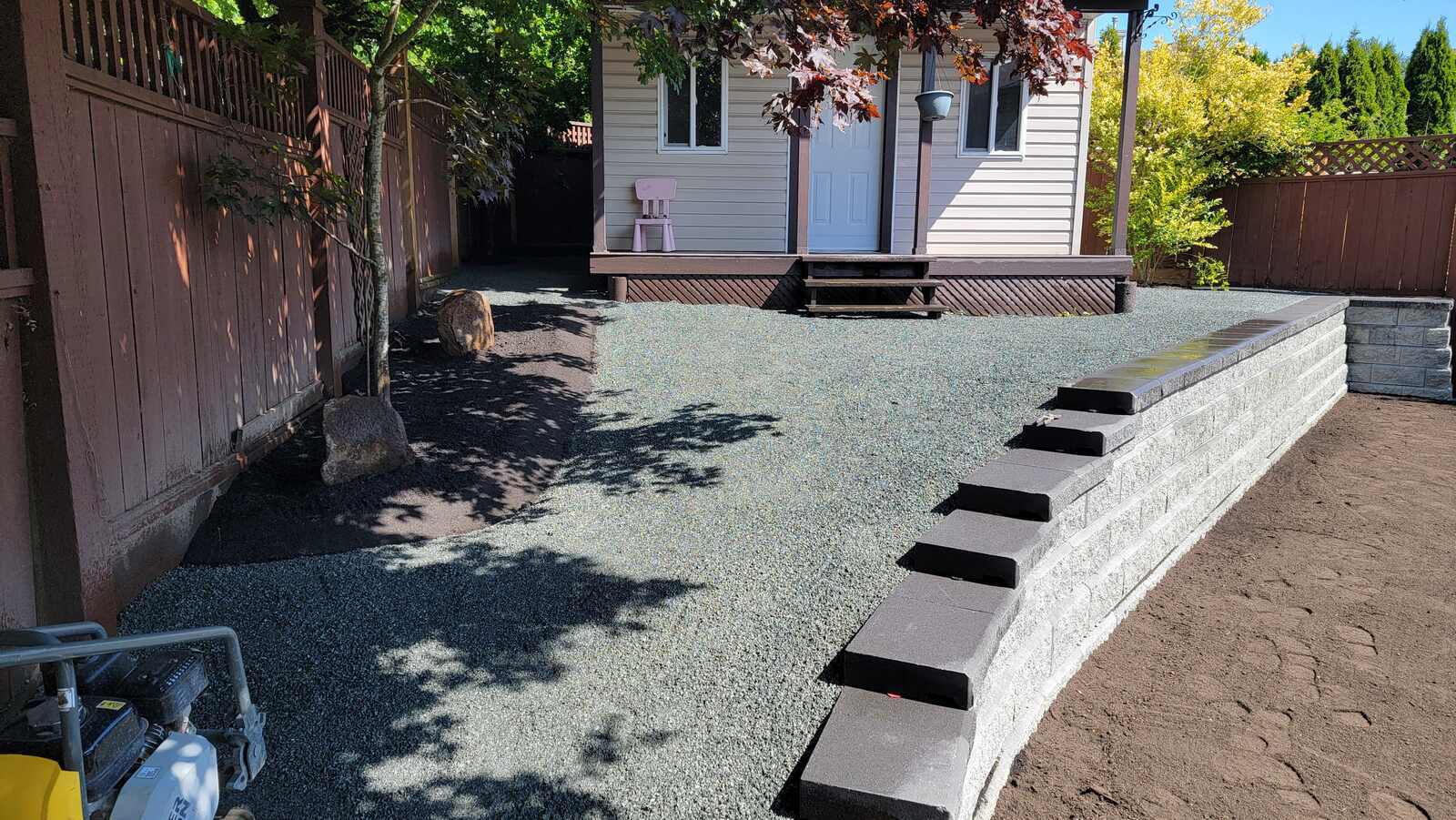 19_Retaining wall project with fresh gravel and prepared topsoil by Back40 Landscaping in Mission, BC