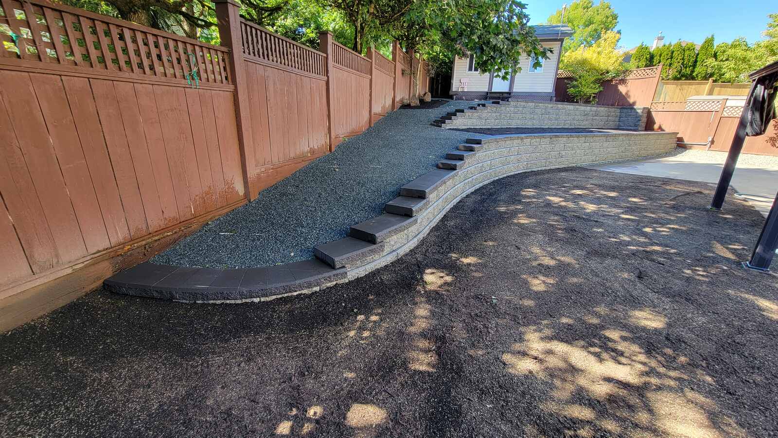 26_Full view of a completed landscaping project with retaining wall by Back40 Landscaping, Mission, BC