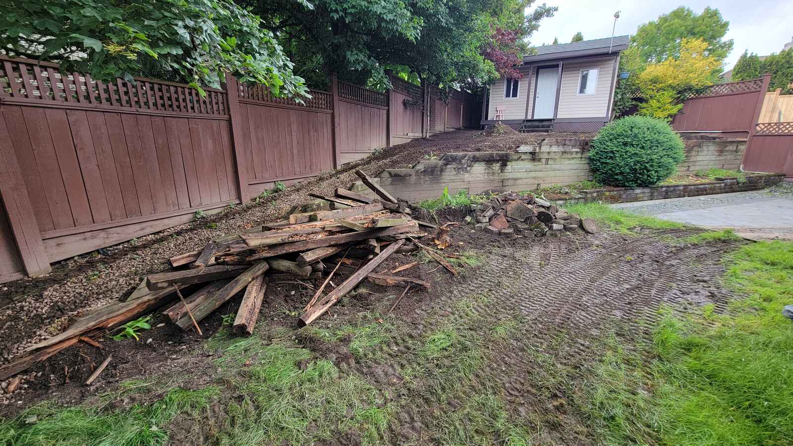 7_heavy-equipment-preparing-soil-for-retaining-wall-construction-back40-landscaping-langley-bc