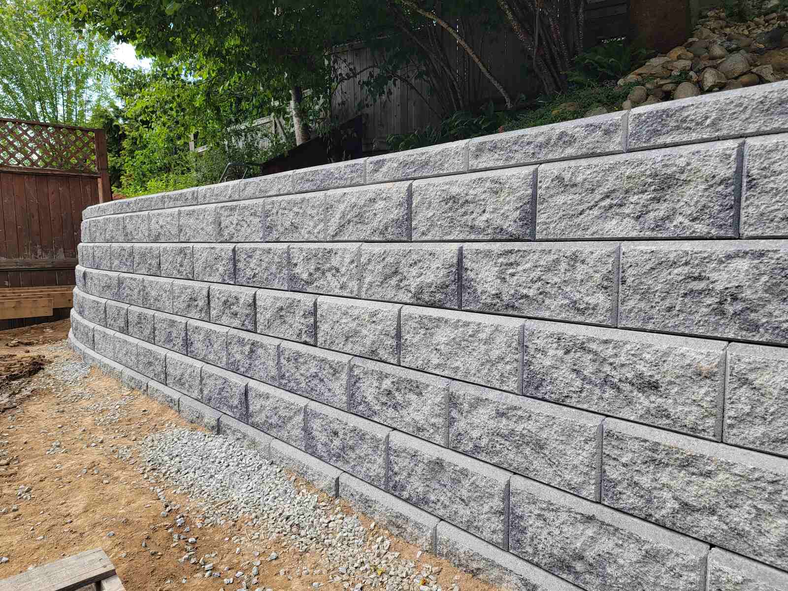 15_Gravel-filled retaining wall foundation under construction by Back40 Landscaping in Mission, BC