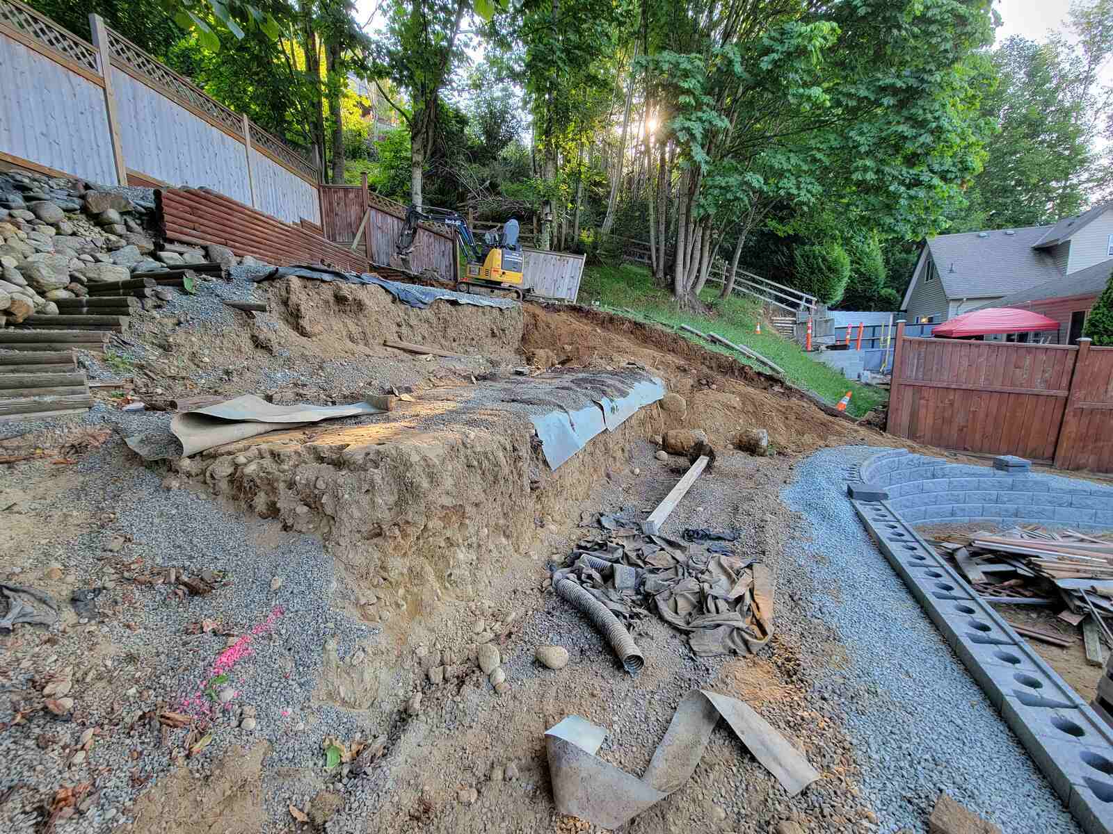 17_Excavation site showing hillside preparation for retaining wall by Back40 Landscaping in Mission, BC