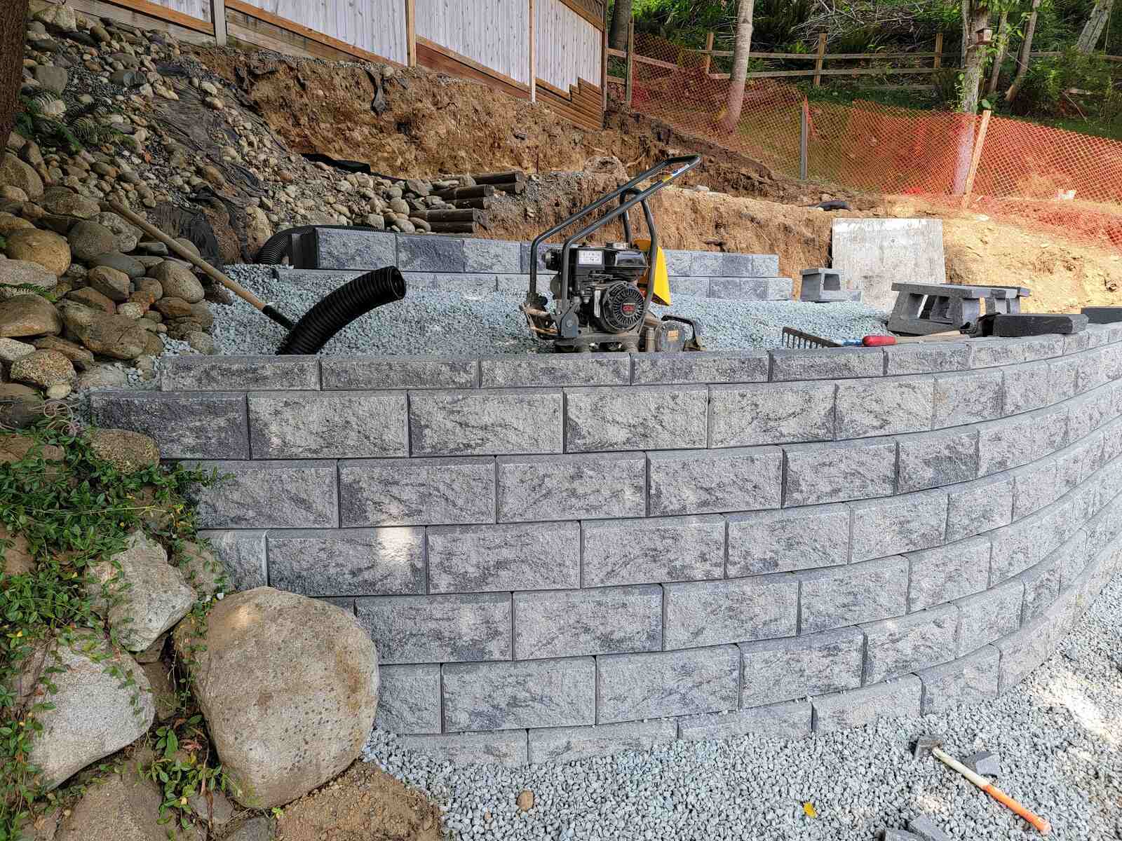 19_Mission, BC backyard retaining wall with tiered stone design by Back40 Landscaping