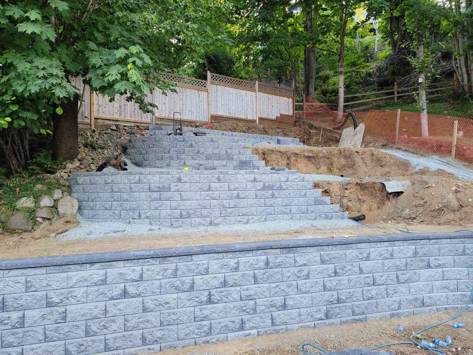 20_Completed multi-tiered retaining wall with landscaped surroundings by Back40 Landscaping in Mission, BC