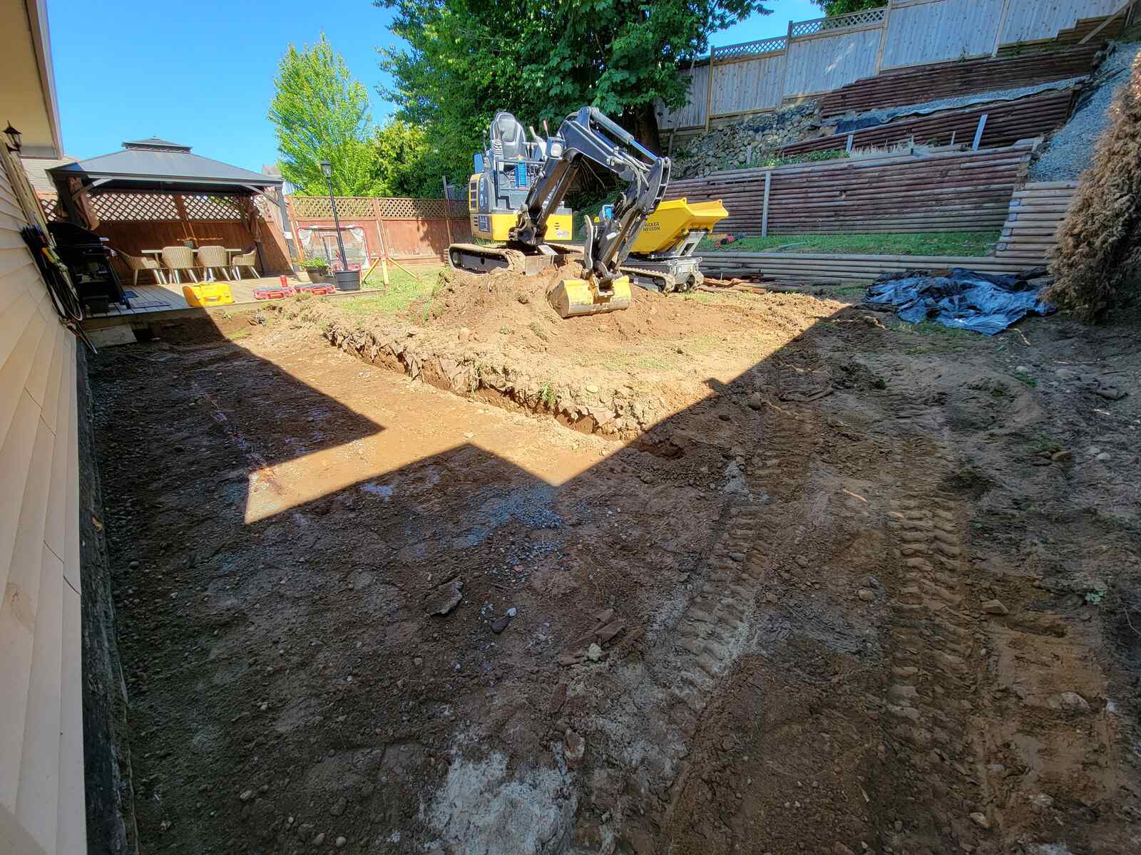 4_Excavation work underway for a four-tiered retaining wall by Back40 Landscaping in Mission, BC