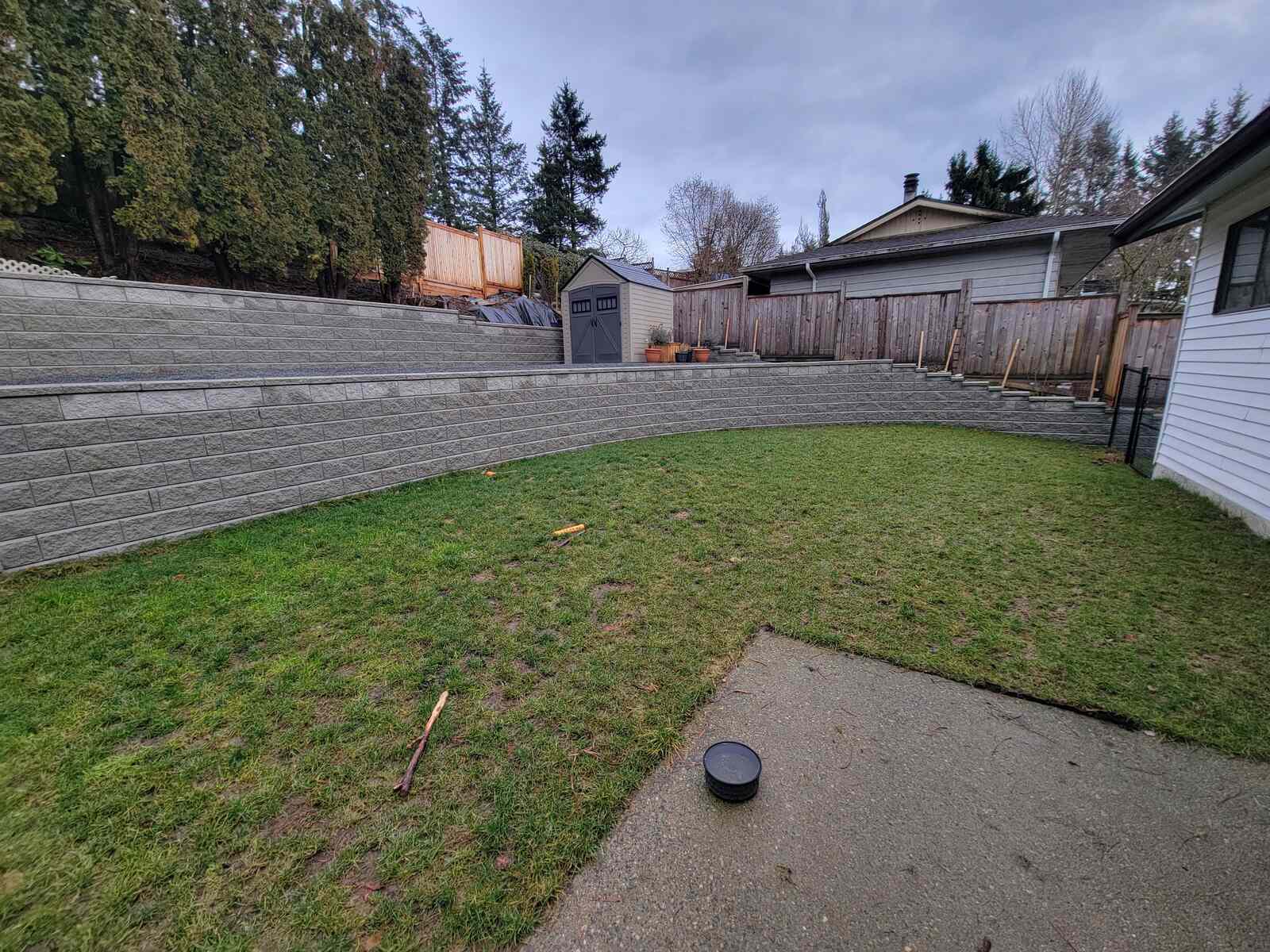 17_Spacious backyard with retaining walls and landscaping features by Back40 Landscaping in Mission, BC