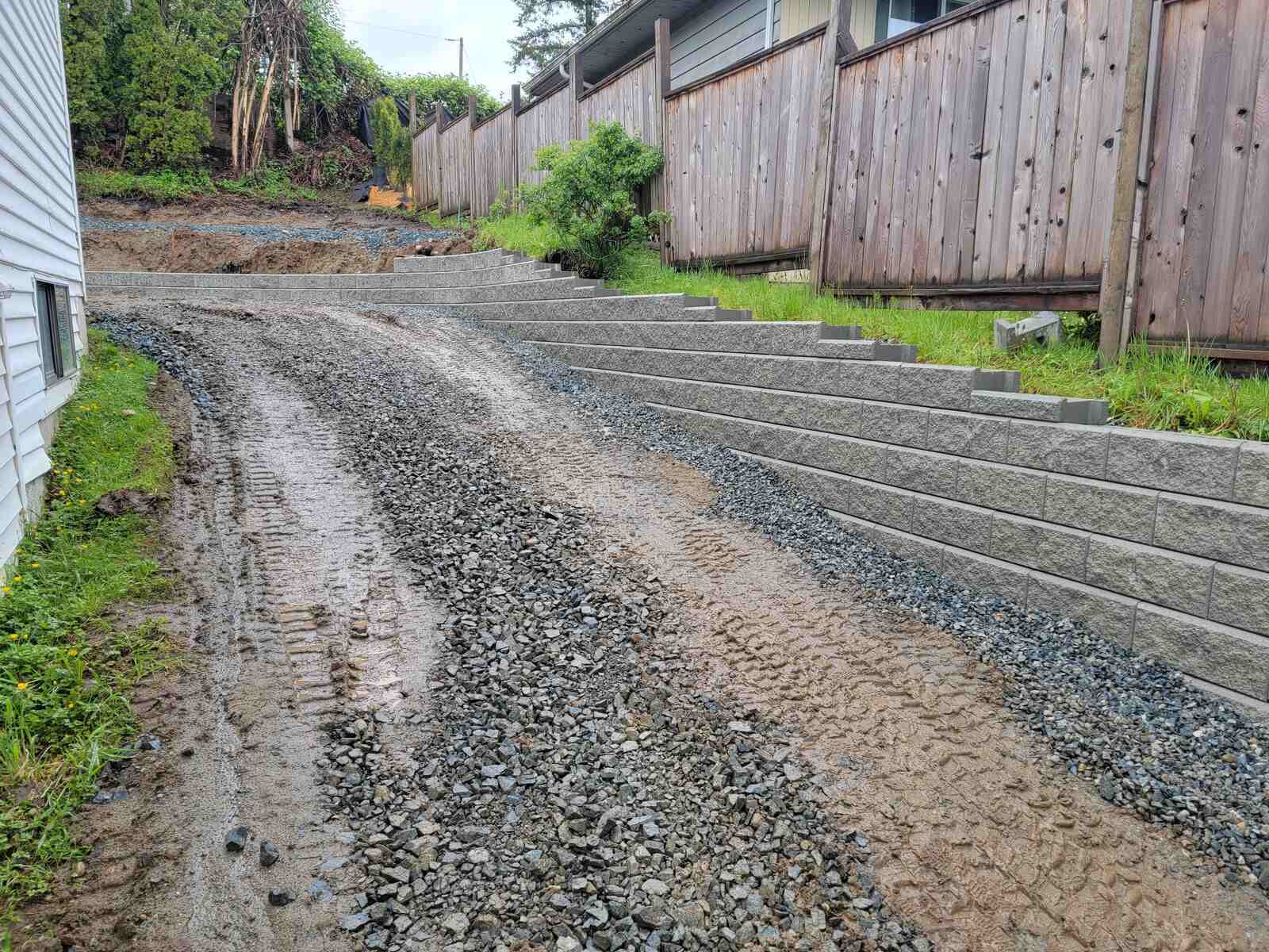 6_Gravel driveway with newly installed retaining wall by Back40 Landscaping in Mission, BC