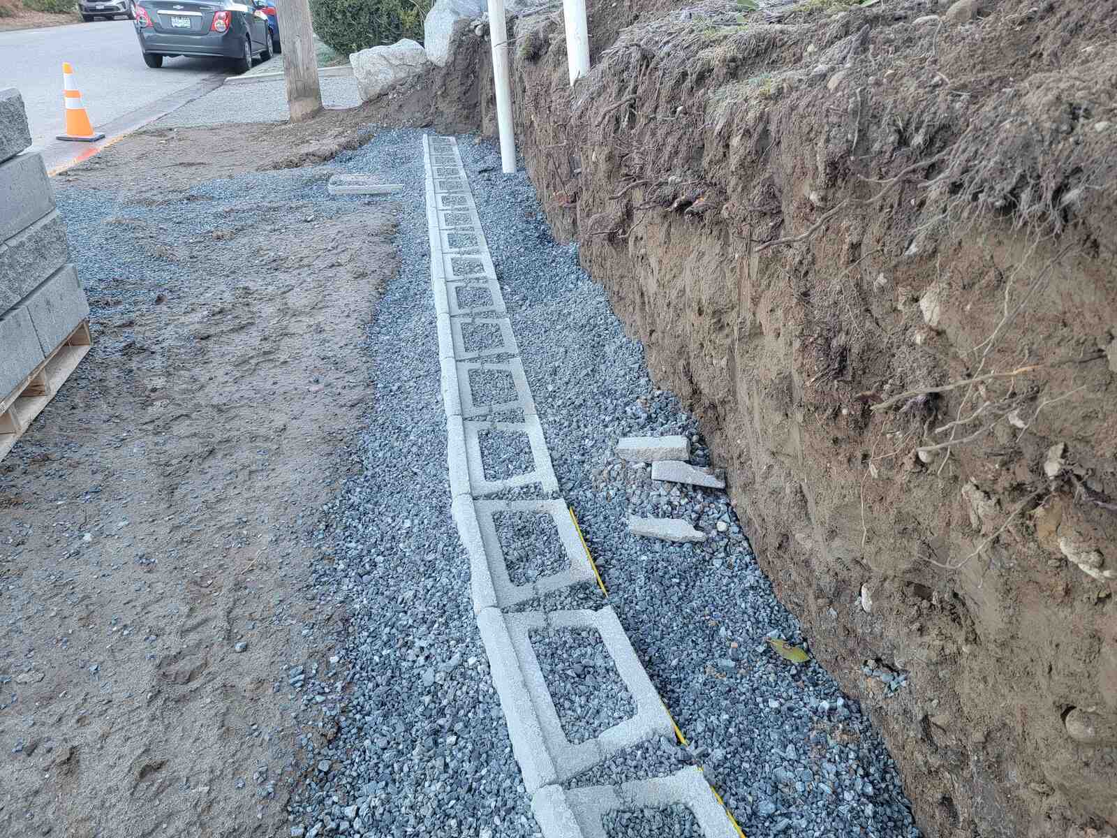 11_Gravel base prepared for a retaining wall foundation in Mission, BC, by Back40 Landscaping