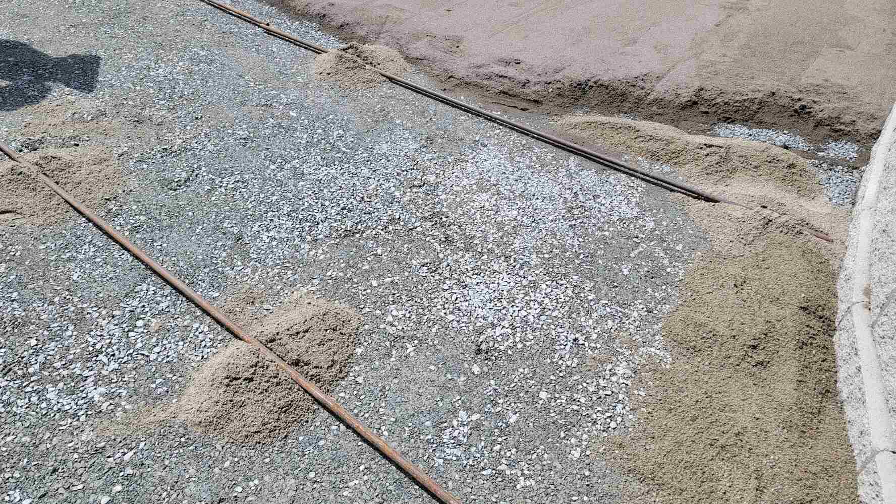 16_Sand distribution for precise flagstone patio installation by Back40 Landscaping in Mission, BC