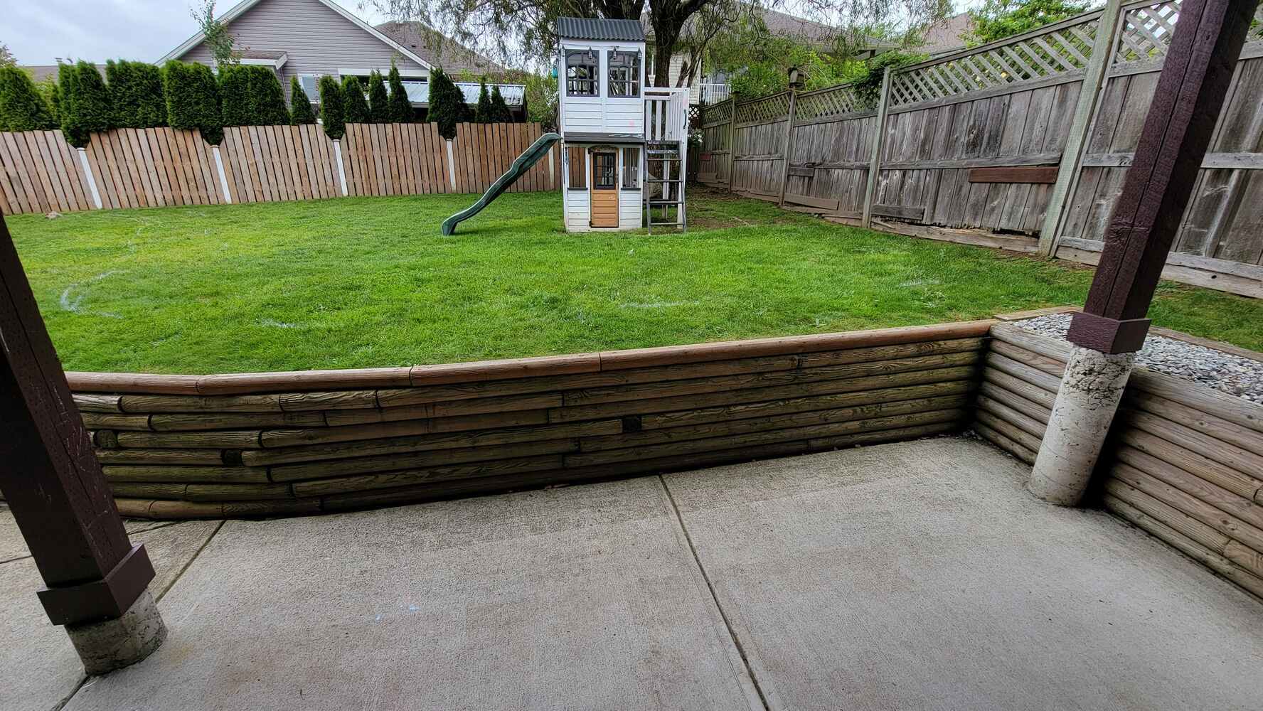 3_Close-up of leveling gravel in a trench for a retaining wall by Back40 Landscaping in Mission, BC