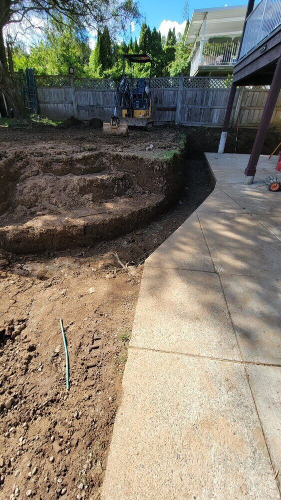 5_Concrete block arrangement for a curved retaining wall, installed by Back40 Landscaping in Mission, BC