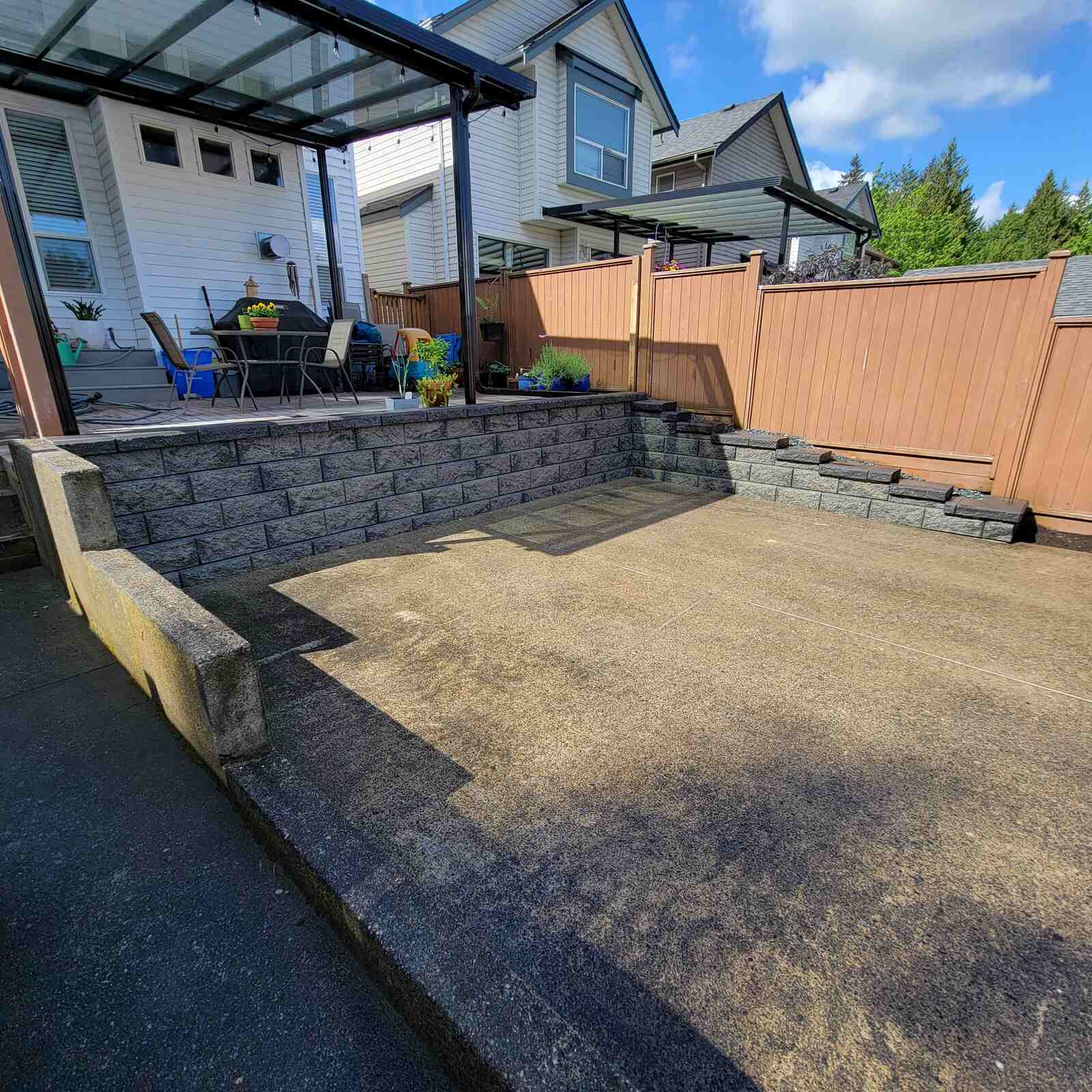 Completed backyard retaining wall in Langley, BC by Back 40 Landscaping