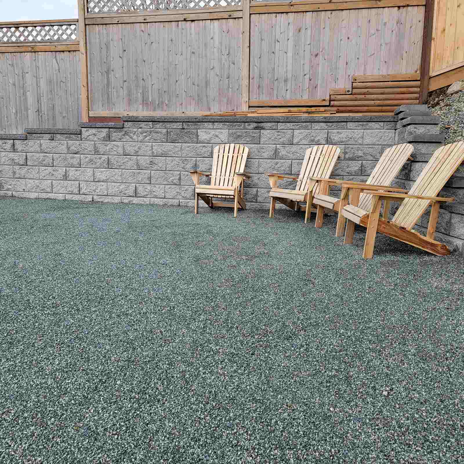 Elevated view of backyard landscaping with retaining wall by Back 40 Landscaping in Langley, BC