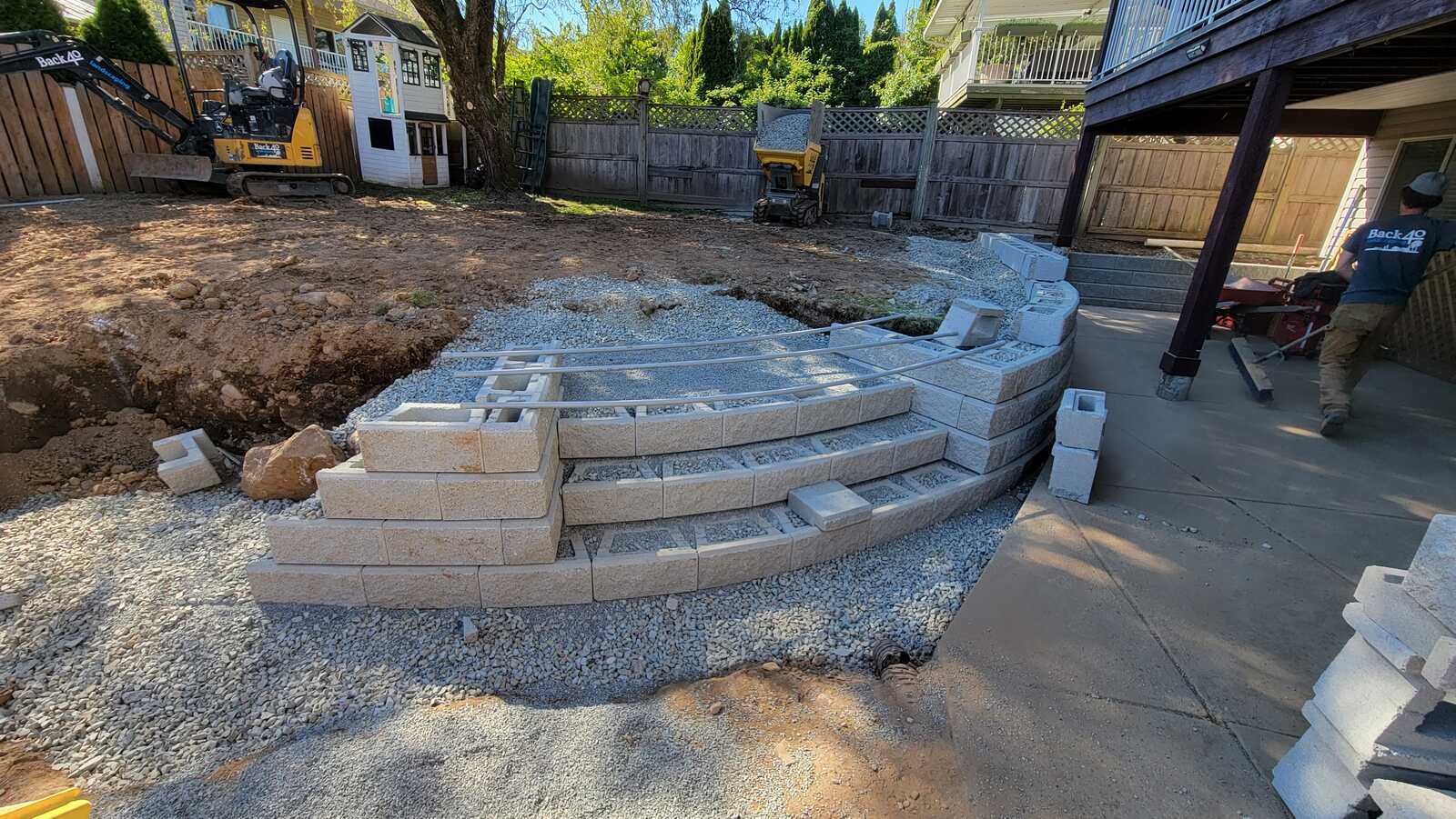 Retaining wall construction in progress by Back 40 Landscaping in Mission, BC