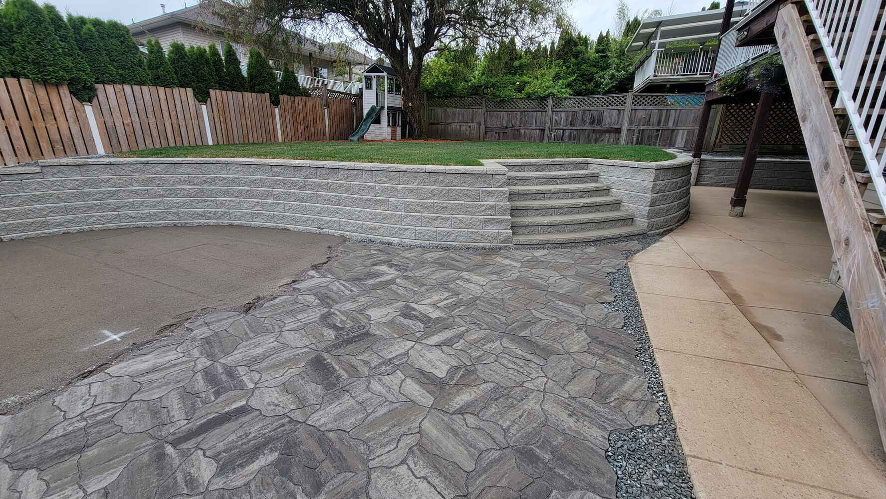 26_Close-up of stone steps and retaining wall constructed by Back40 Landscaping in Mission, BC